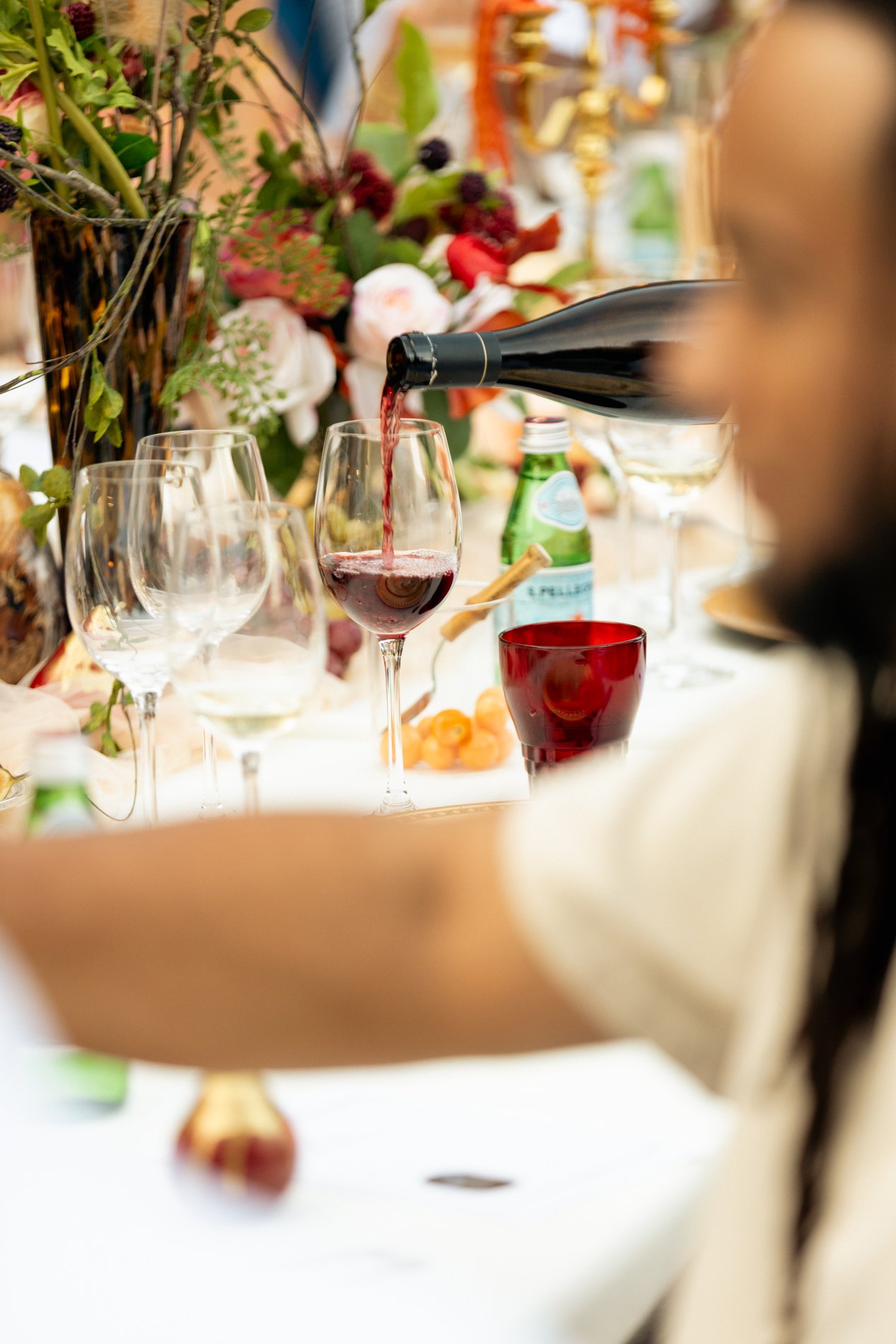 Wine being poured at the table