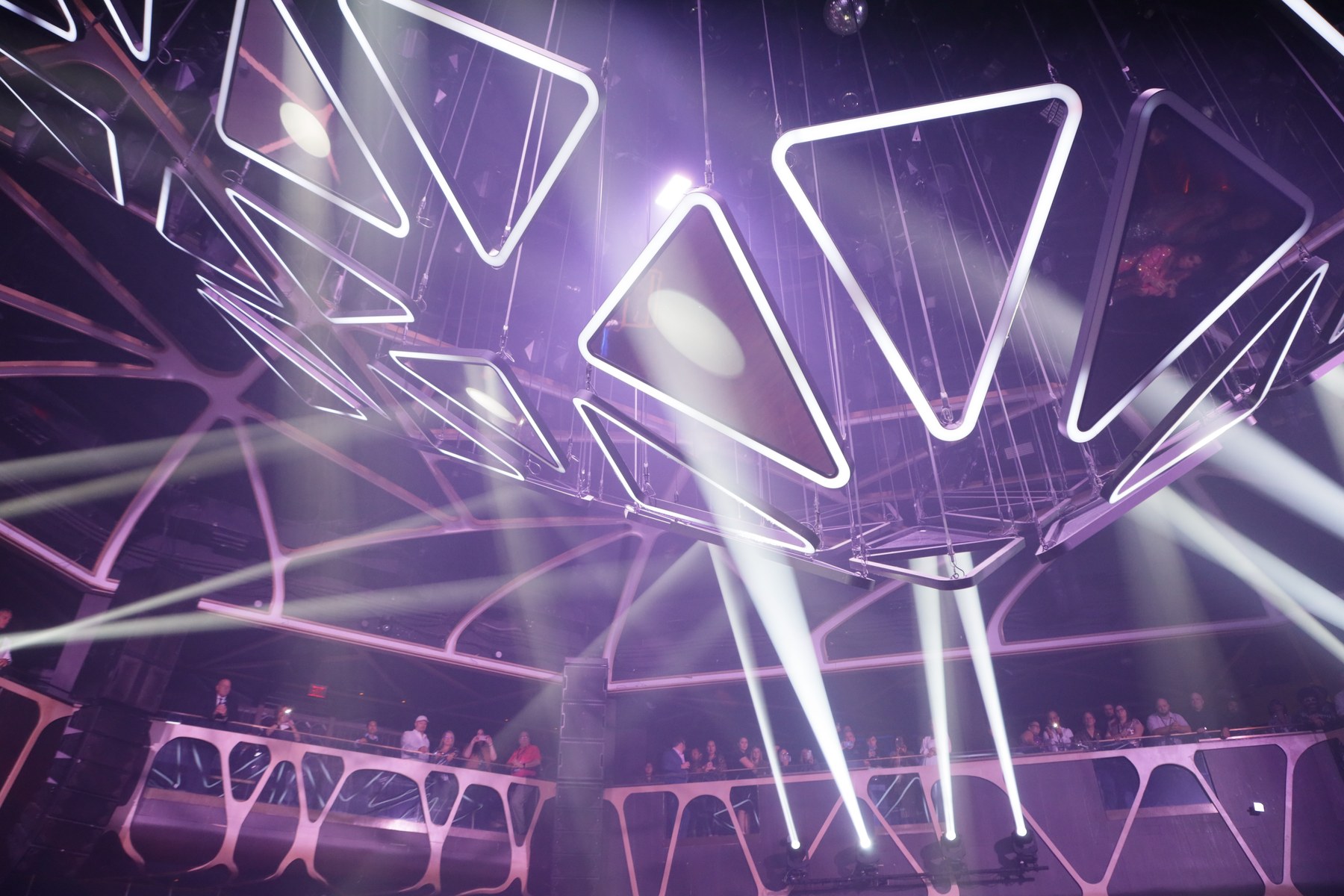 Guests around an optical illusion dance floor